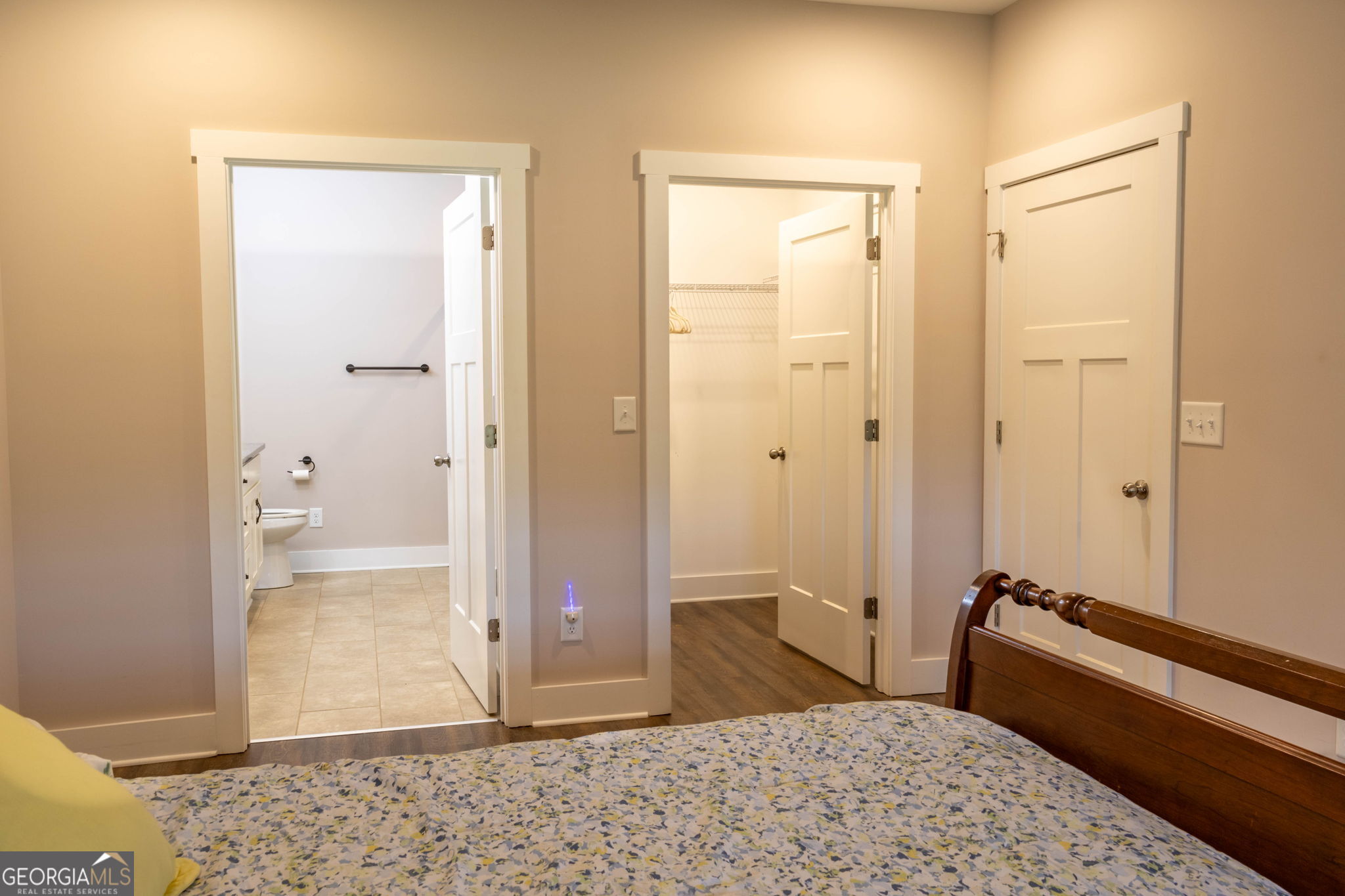 212 Old Clarkesville Mill Road, Unit C Clarkesville, GA 30523 - Photo 20 of 55 a bedroom with a bed and a walk in closet