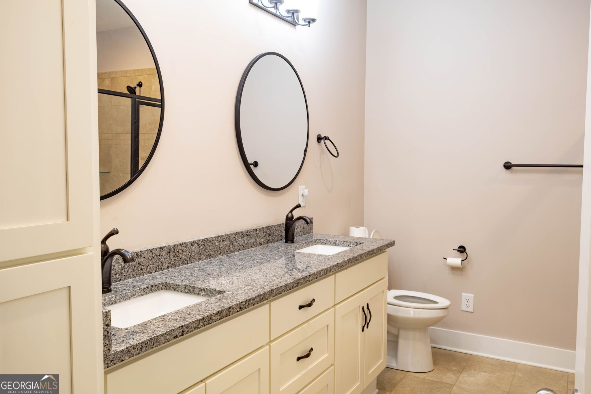 212 Old Clarkesville Mill Road, Unit C Clarkesville, GA 30523 - Photo 23 of 55 a bathroom with a granite countertop toilet sink and mirror