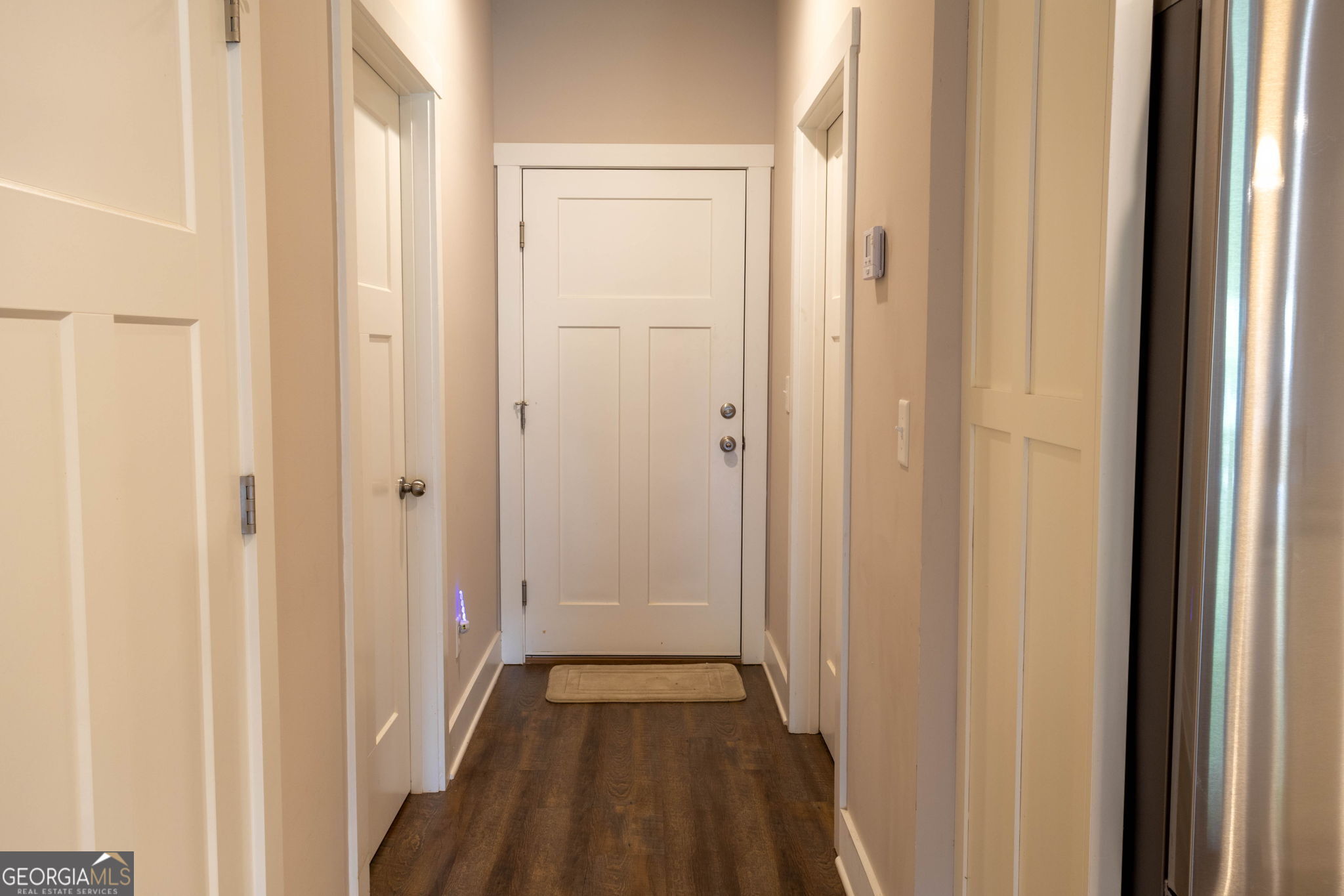 212 Old Clarkesville Mill Road, Unit C Clarkesville, GA 30523 - Photo 30 of 55 a view of a hallway with wooden floor