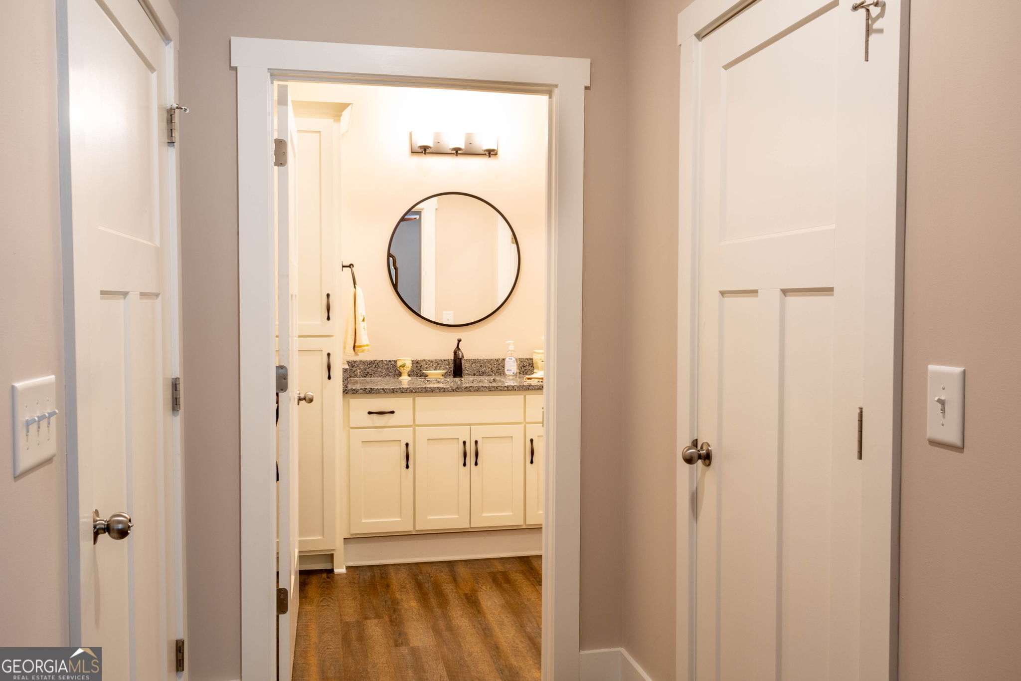 212 Old Clarkesville Mill Road, Unit C Clarkesville, GA 30523 - Photo 35 of 55 a bathroom with a sink a toilet and a mirror