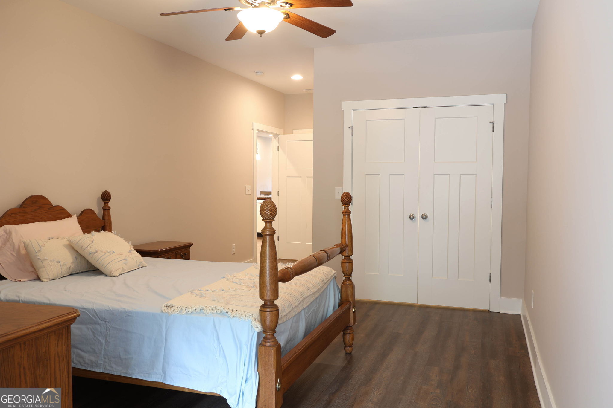 212 Old Clarkesville Mill Road, Unit C Clarkesville, GA 30523 - Photo 37 of 55 a bedroom with a bed and a chandelier