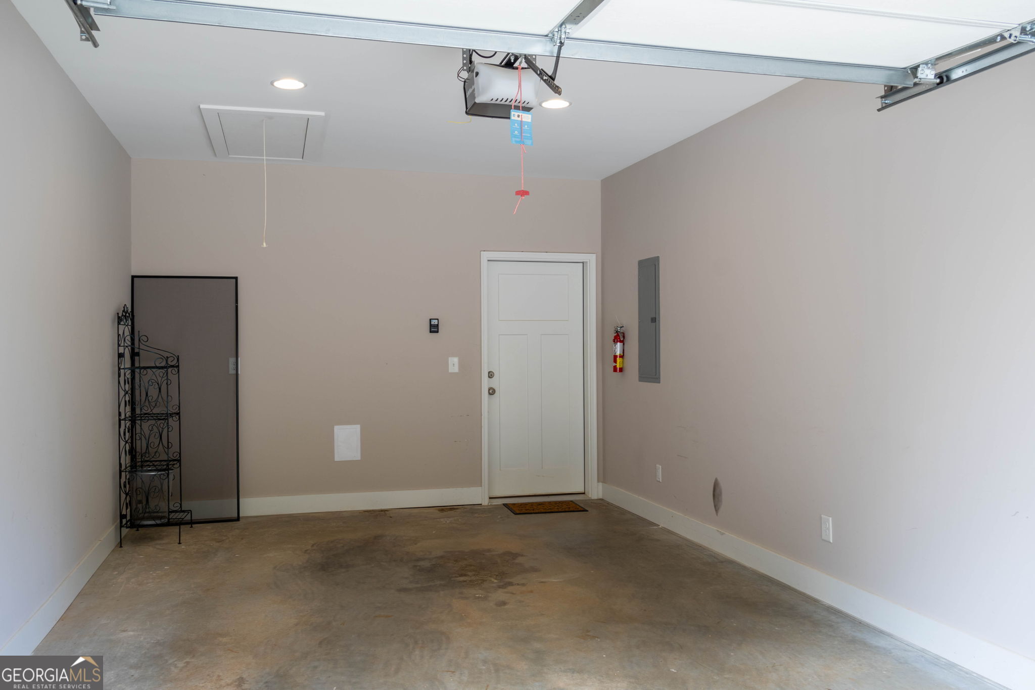 212 Old Clarkesville Mill Road, Unit C Clarkesville, GA 30523 - Photo 41 of 55 an empty room with an entryway and fan
