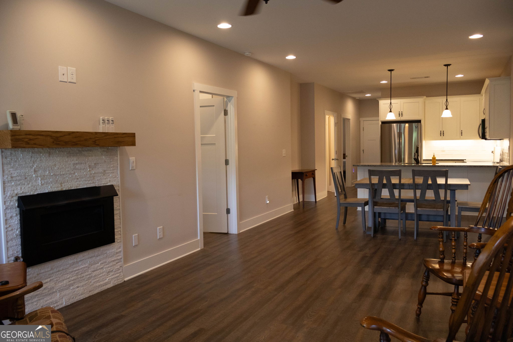 212 Old Clarkesville Mill Road, Unit C Clarkesville, GA 30523 - Photo 10 of 55 a open kitchen with a table and chairs