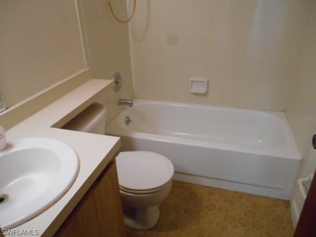 7441-43 Garry Road Fort Myers, FL 33967 - Photo 11 of 15 a bathroom with a sink and a toilet