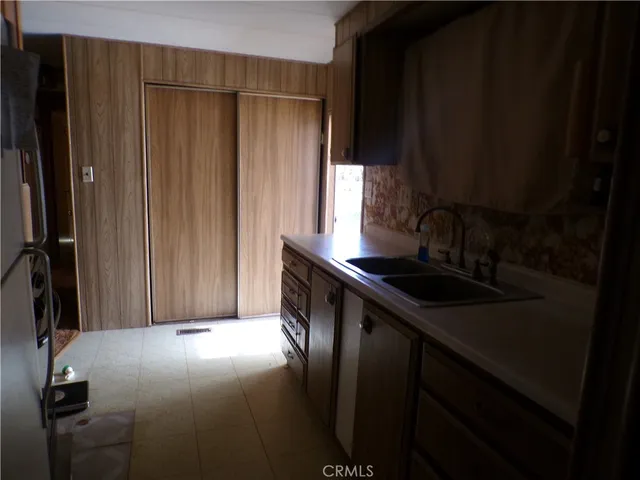 a view of a backyard of the house