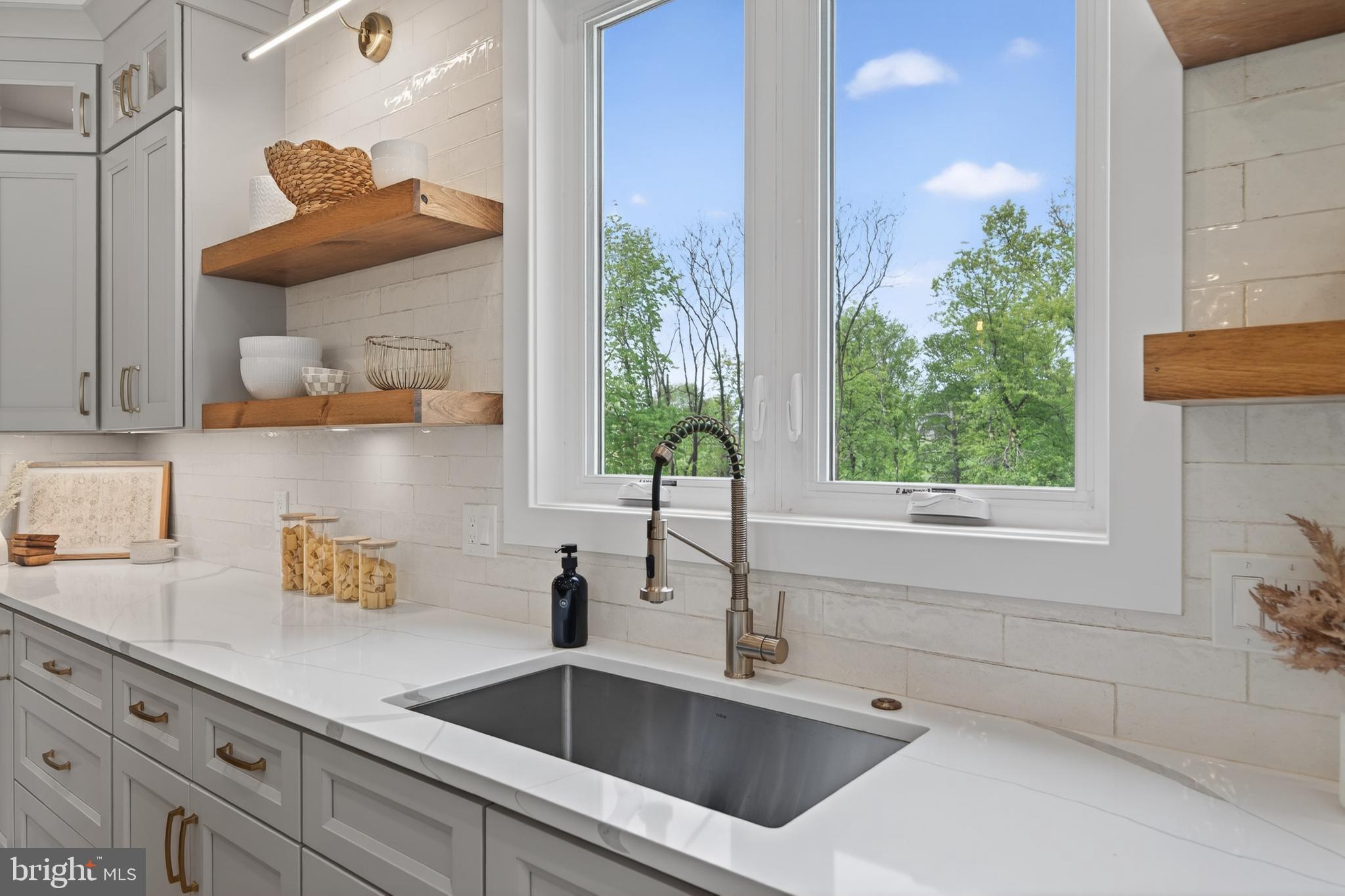 13 Rhoads Lane Media, PA 19063 - Photo 20 of 67 a kitchen with a sink and a window