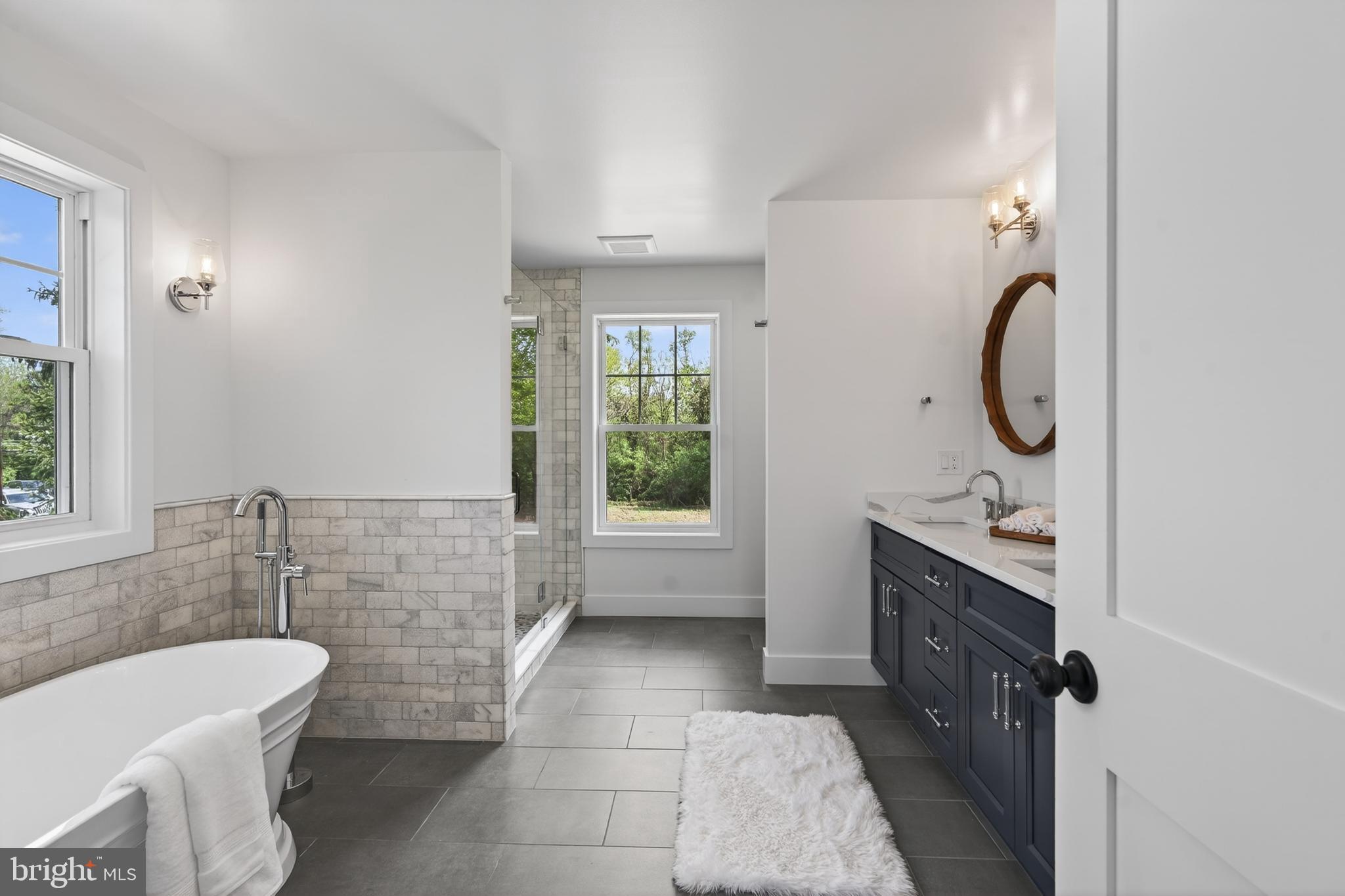 13 Rhoads Lane Media, PA 19063 - Photo 44 of 67 a bathroom with a granite countertop sink a toilet and bathtub
