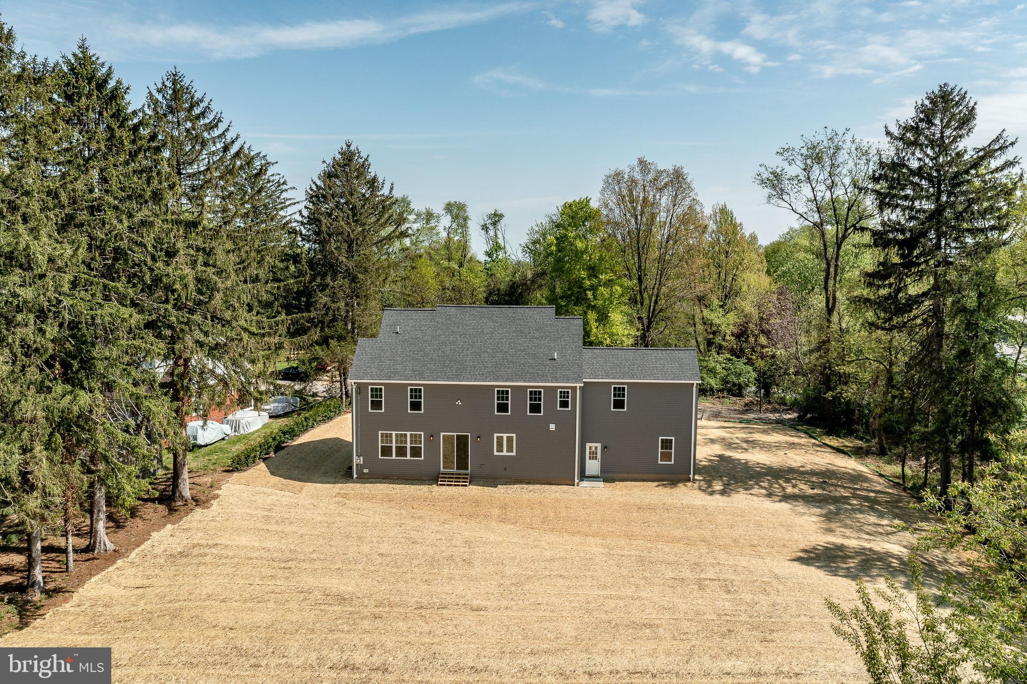 13 Rhoads Lane Media, PA 19063 - Photo 63 of 67 a view of a house with a yard and trees