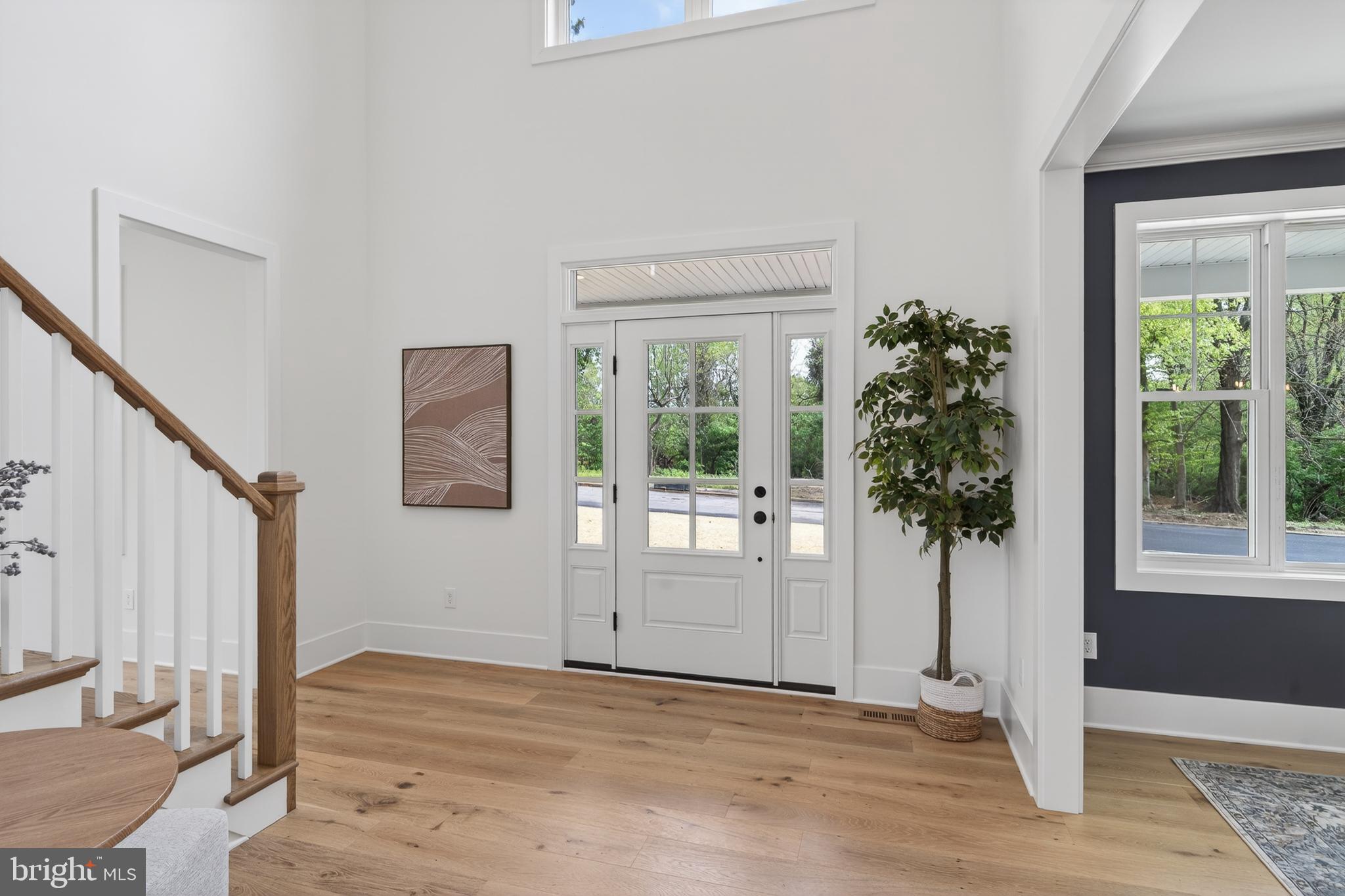 13 Rhoads Lane Media, PA 19063 - Photo 10 of 67 a view of an entryway with wooden floor and door