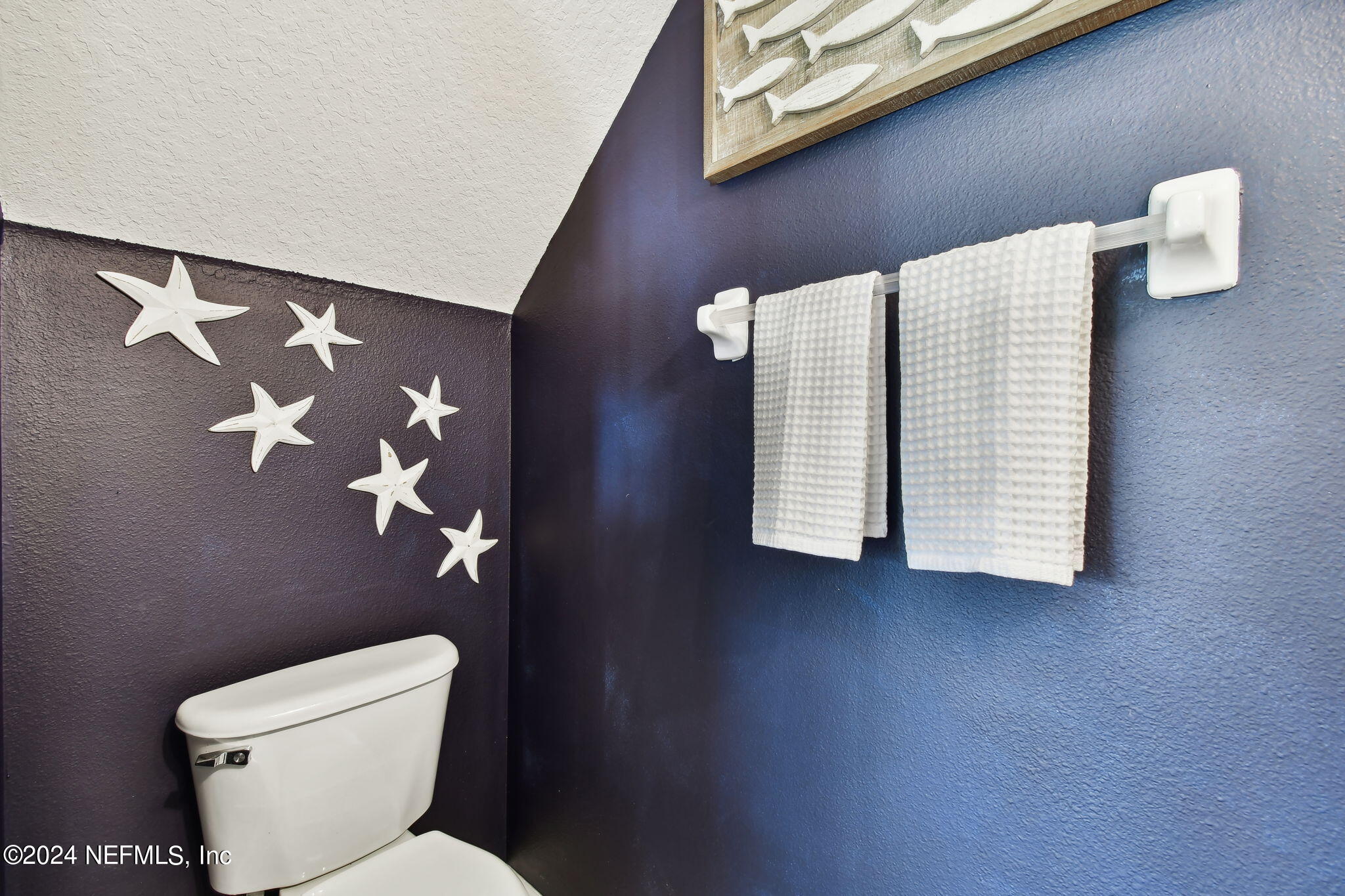 7473 Devondale Way Jacksonville, FL 32256 - Photo 21 of 68 a bathroom with a toilet and sink