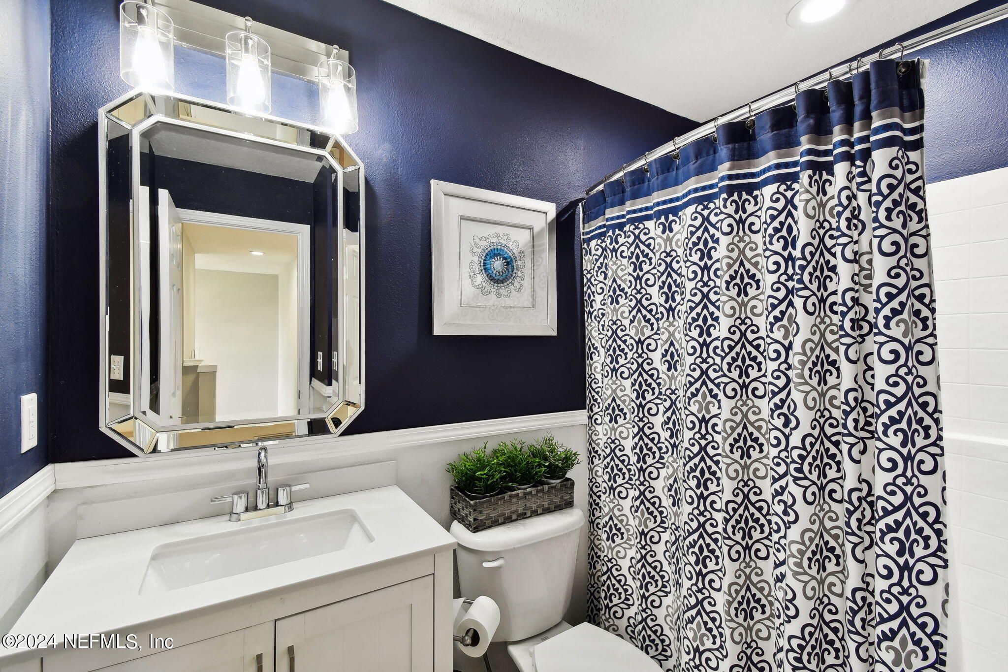 7473 Devondale Way Jacksonville, FL 32256 - Photo 30 of 68 a bathroom with a sink toilet and shower