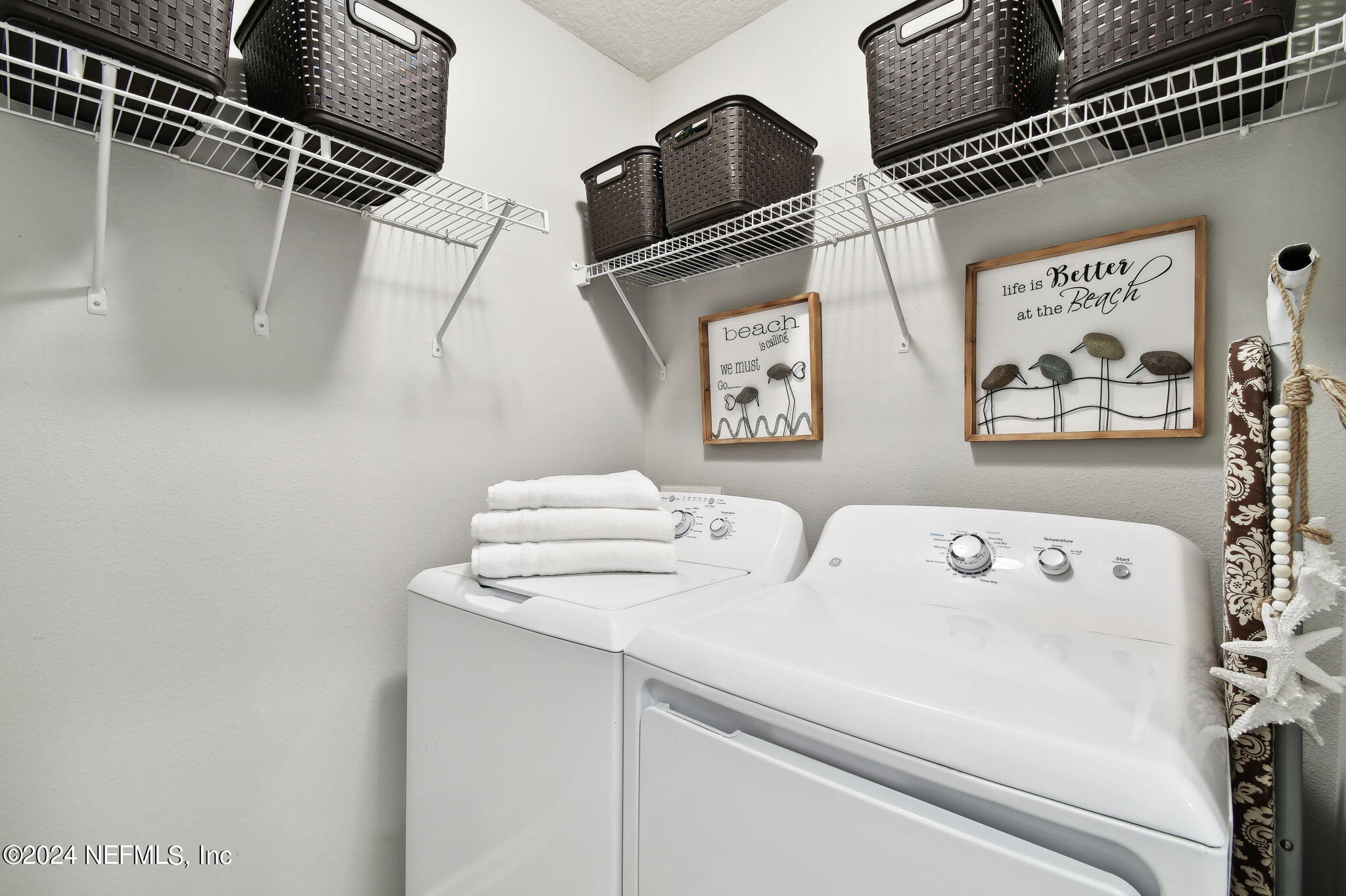 7473 Devondale Way Jacksonville, FL 32256 - Photo 31 of 68 a utility room with dryer and washer