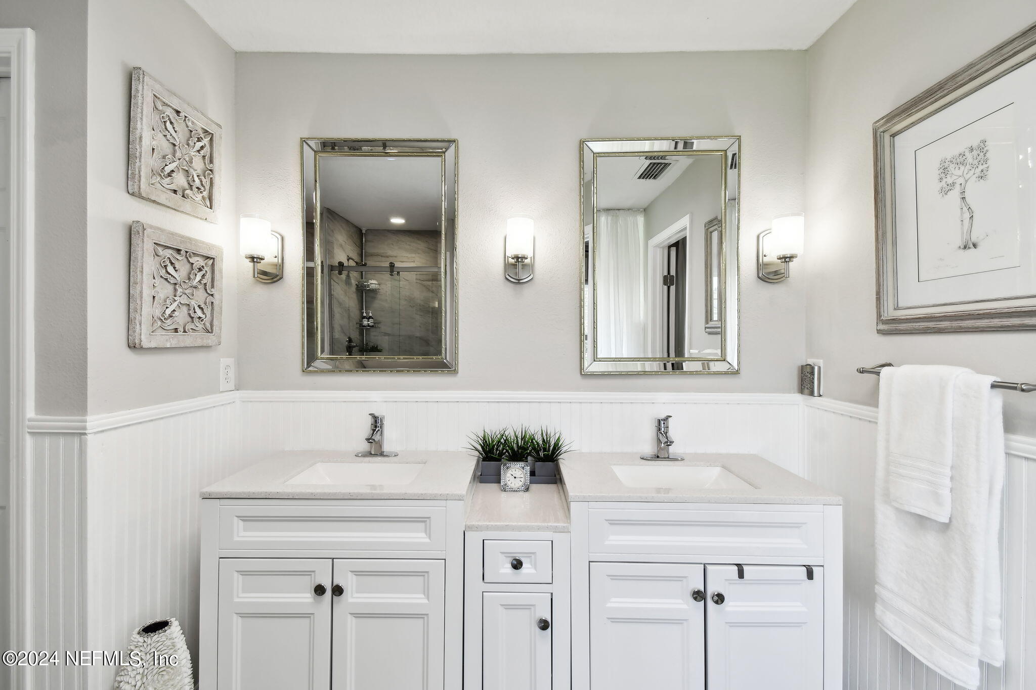 7473 Devondale Way Jacksonville, FL 32256 - Photo 41 of 68 a bathroom with a sink and a mirror