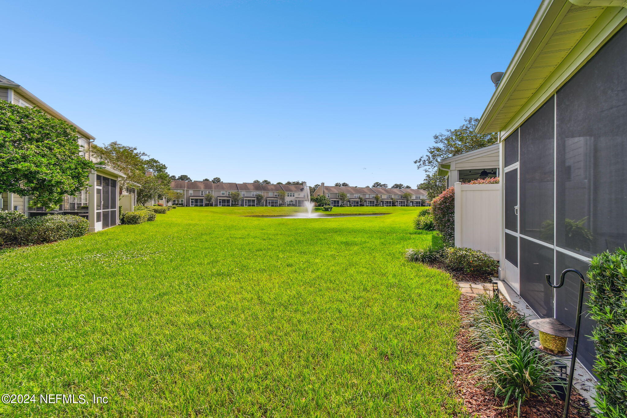 7473 Devondale Way Jacksonville, FL 32256 - Photo 46 of 68 a view of yard with swimming pool and green space