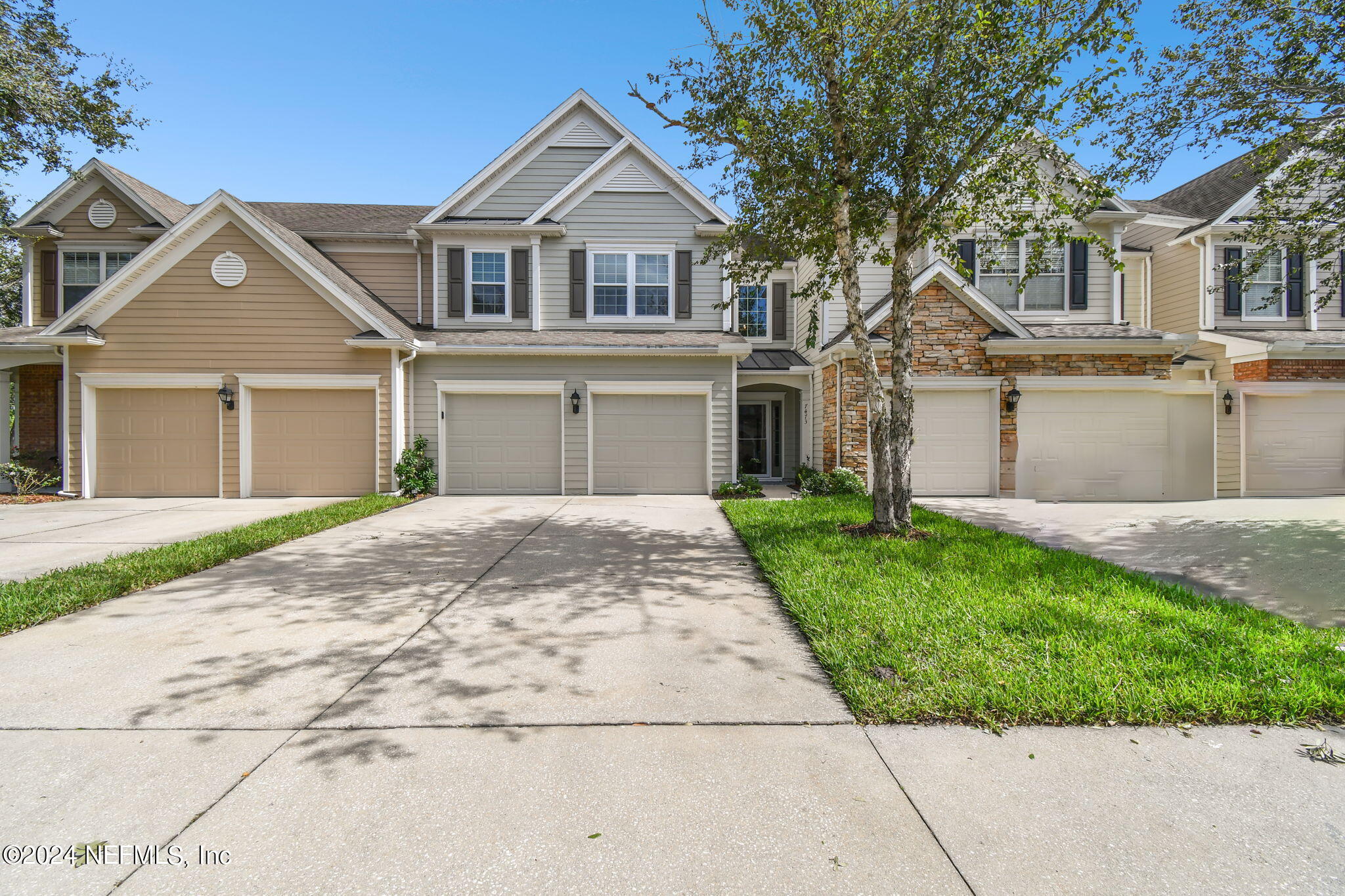7473 Devondale Way Jacksonville, FL 32256 - Photo 53 of 68 front view of a house with a yard