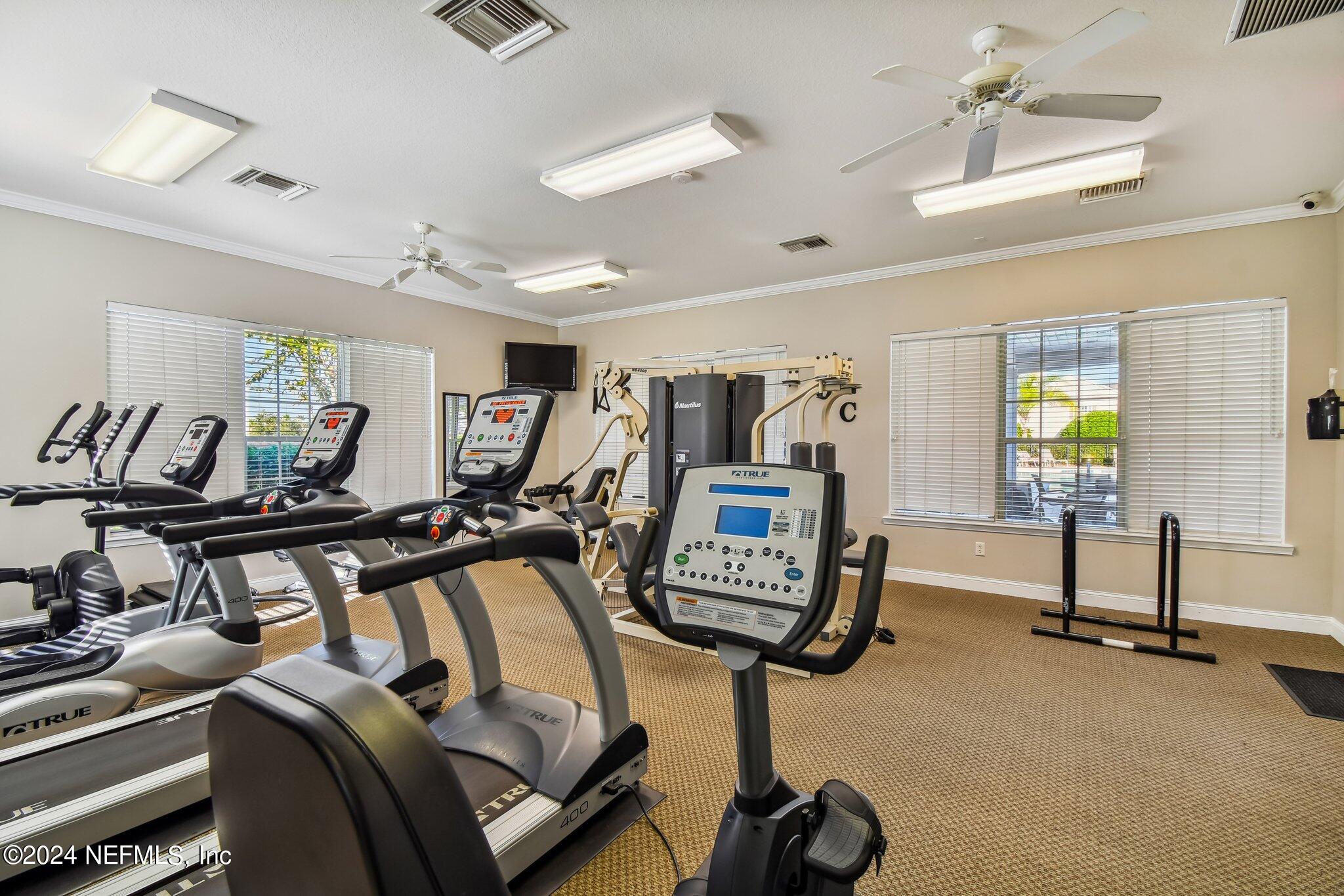 7473 Devondale Way Jacksonville, FL 32256 - Photo 56 of 68 a view of a room with gym equipment