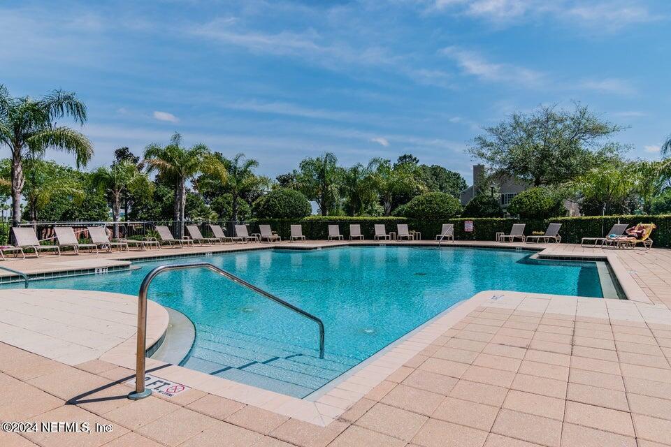 7473 Devondale Way Jacksonville, FL 32256 - Photo 58 of 68 a view of swimming pool with a lake view