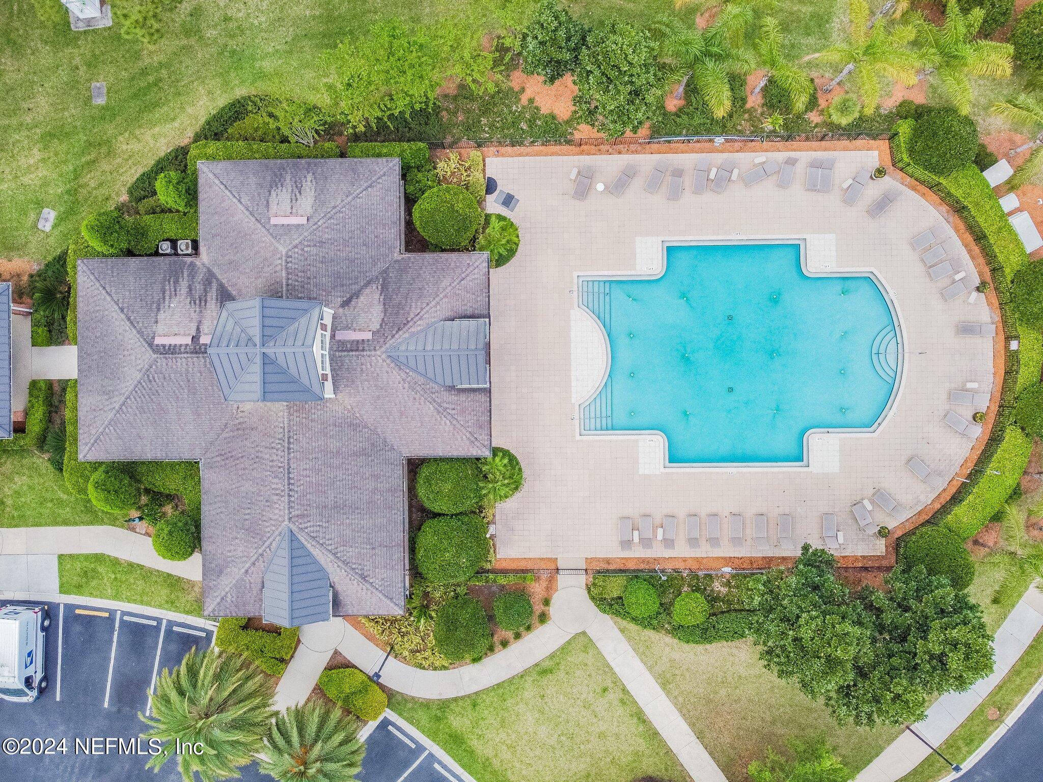 7473 Devondale Way Jacksonville, FL 32256 - Photo 59 of 68 an aerial view of a house with garden space and street view