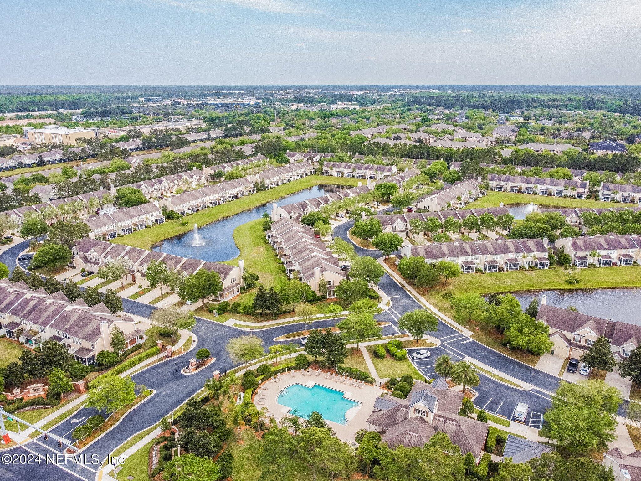 7473 Devondale Way Jacksonville, FL 32256 - Photo 65 of 68 an aerial view of residential building and lake