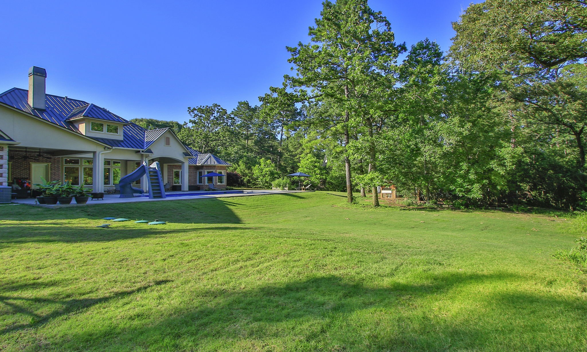 36702 Deer Valley Magnolia, TX 77355 - Photo 38 of 46 a view of a house with a big yard