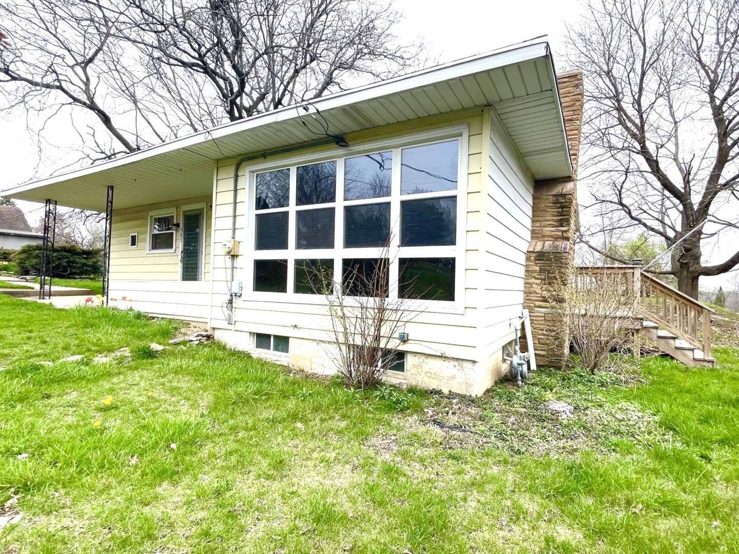 a house with yard in front of it