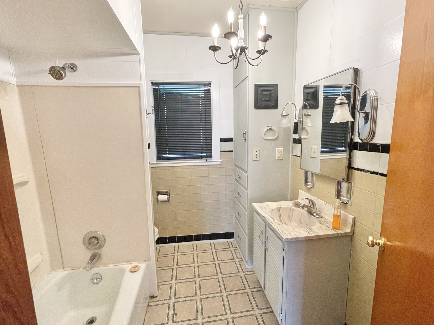 505 North St Paul Street Mark, IL 61326 - Photo 18 of 24 a bathroom with a tub sink and mirror