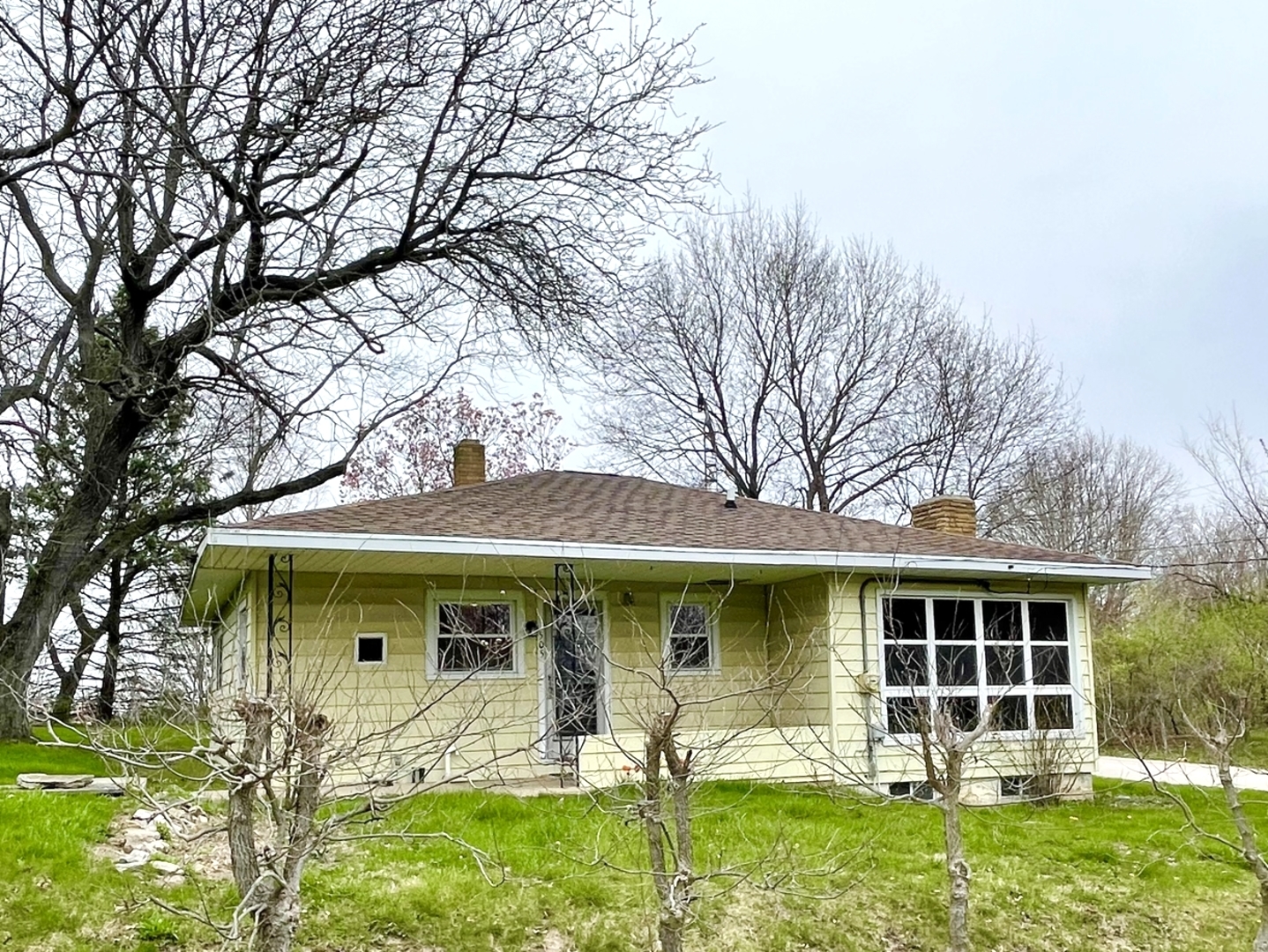 505 North St Paul Street Mark, IL 61326 - Photo 2 of 24 a front view of a house with garden