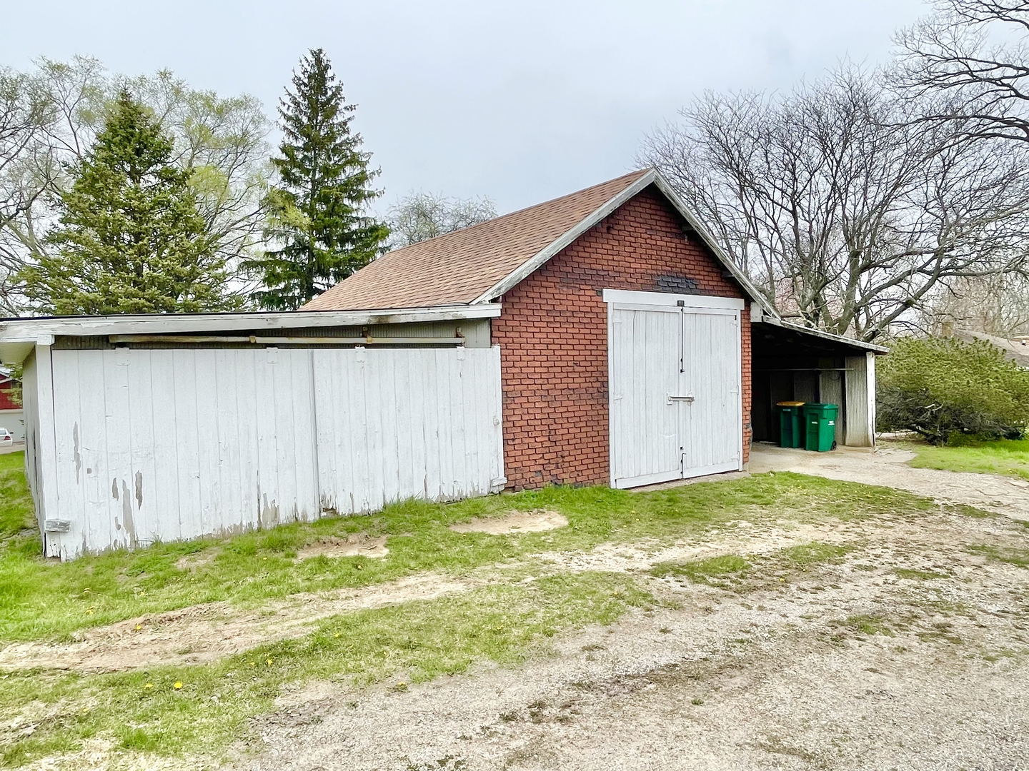 505 North St Paul Street Mark, IL 61326 - Photo 23 of 24 a view of a house with a yard and garage