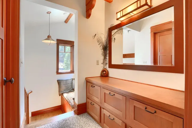 a bathroom with a sink a mirror and a bathtub