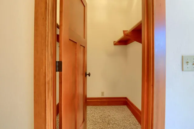 a view of hallway with shower
