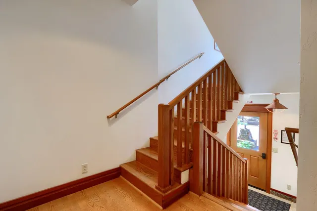 a view of entryway with wooden floor