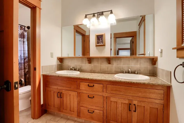 a bathroom with a bathtub and shower