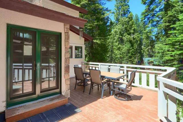 a view of a deck yard from a balcony