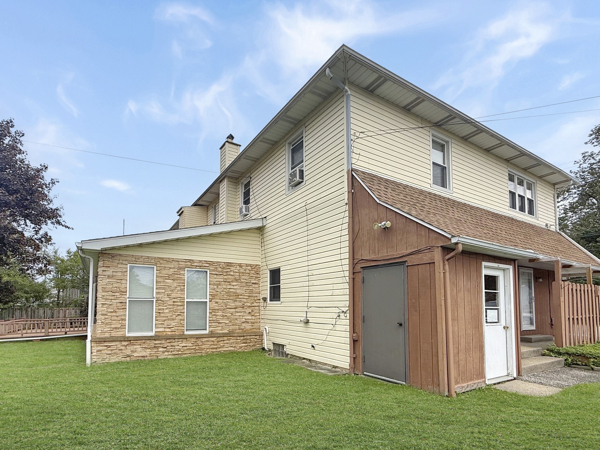 1630 West Gore Road Erie, PA 16509 - Photo 45 of 50 Door on Right is to the Basement, Door on Left is an Attached Shed for Storage for the Owners