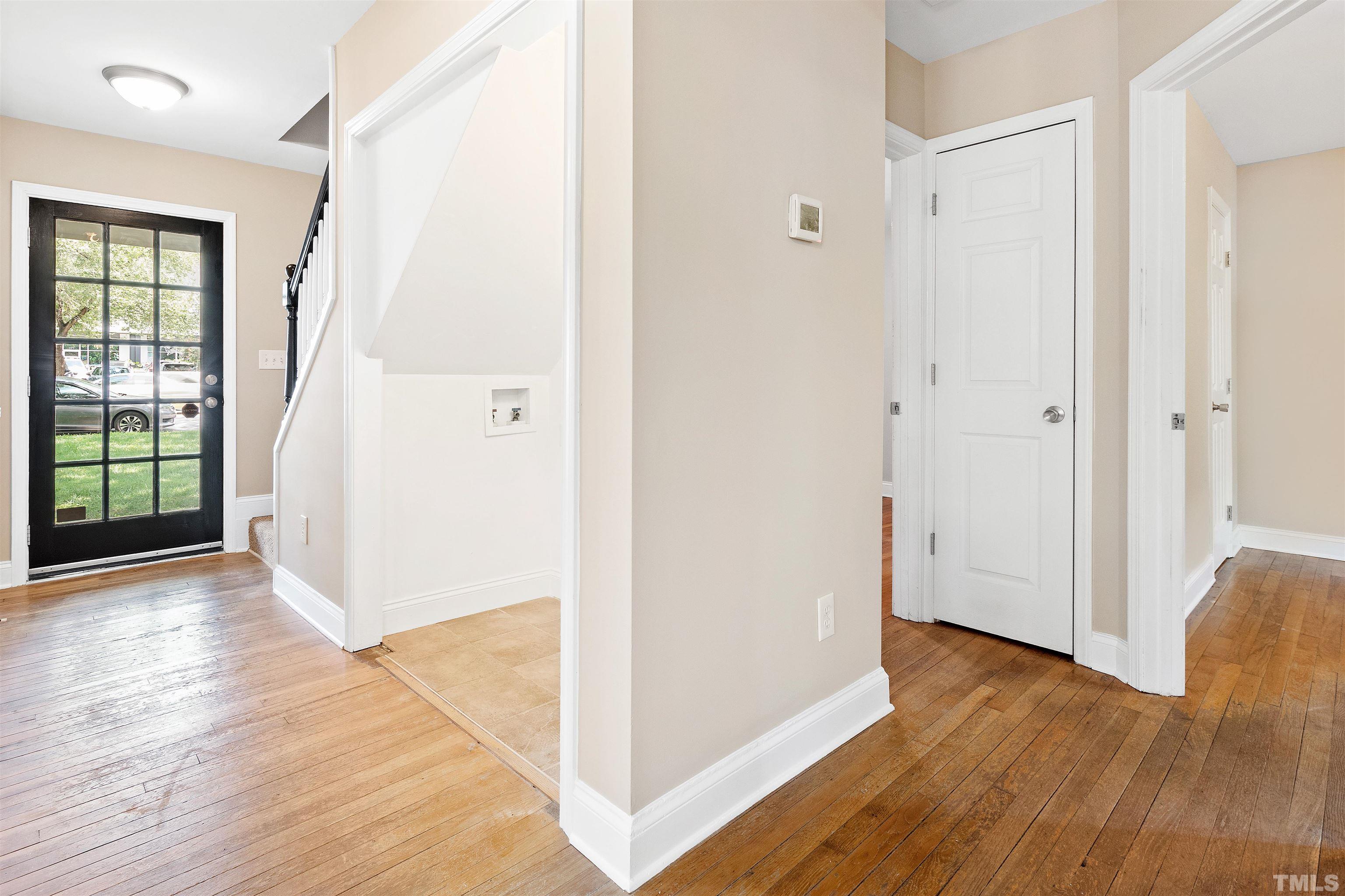 1013 Brookside Drive Raleigh, NC 27604 - Photo 6 of 40 a view of entryway with wooden floor