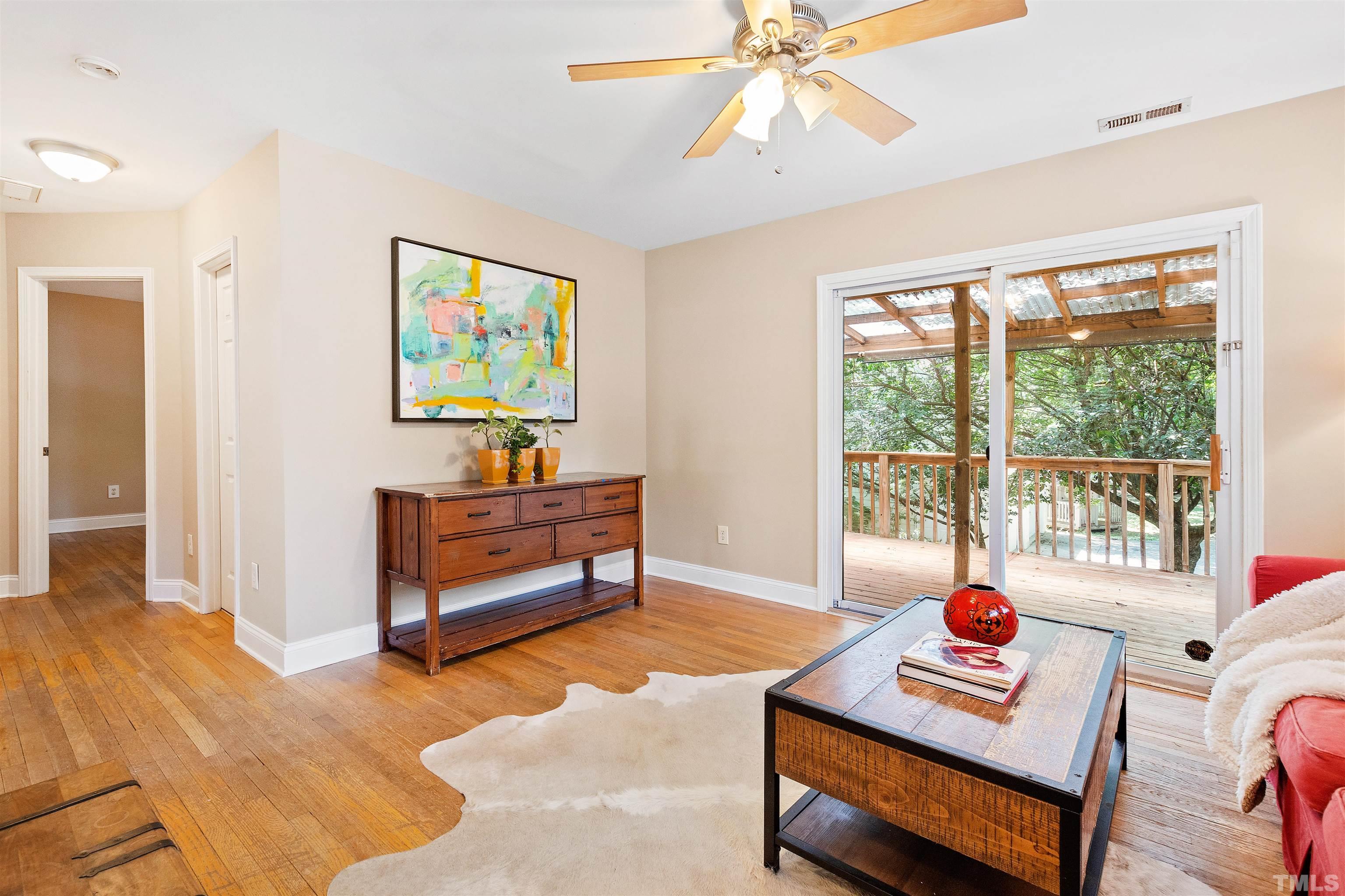 1013 Brookside Drive Raleigh, NC 27604 - Photo 8 of 40 a living room with furniture and a window