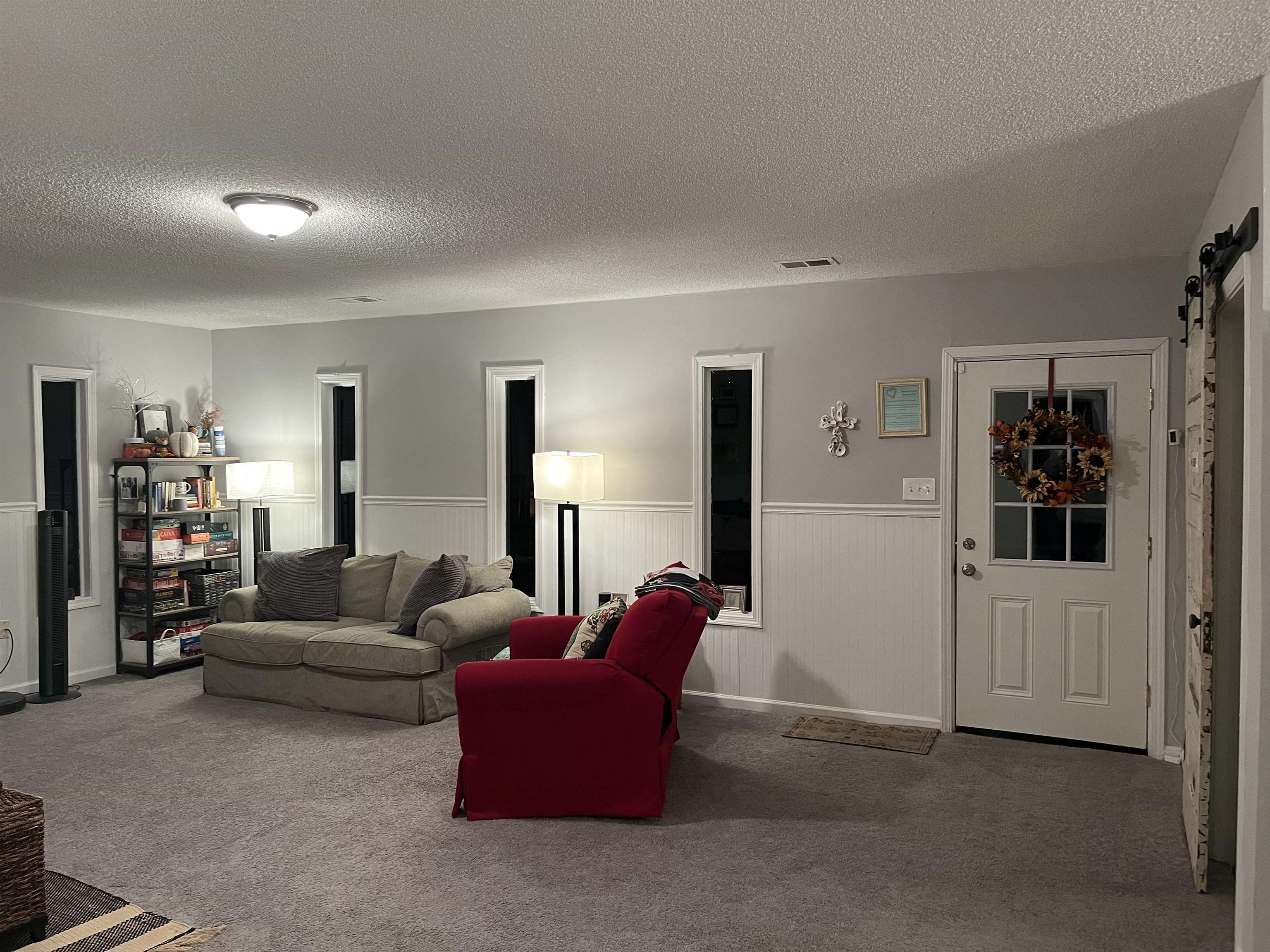723 Spring Street Memphis, TN 38112 - Photo 3 of 18 a living room with furniture and a window