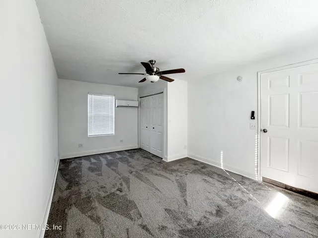 a view of a livingroom with a hardwood floor