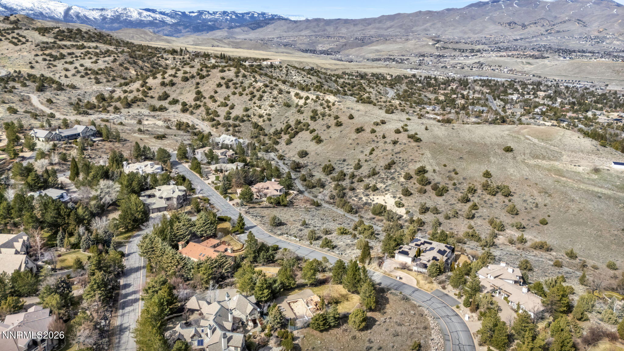 4387 Sharps Road Reno, NV 89519 - Photo 8 of 12 a view of a field with mountains in the background