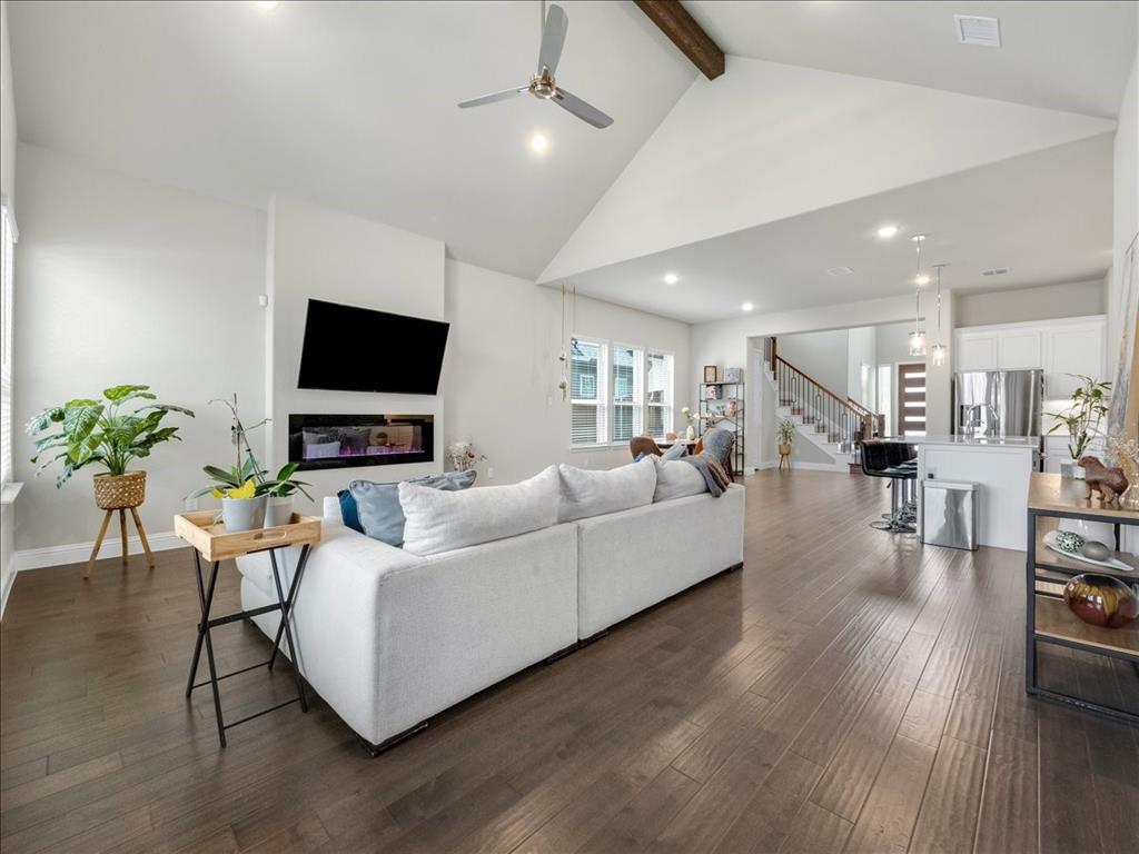 8240 Ottowa Ridge Frisco, TX 75034 - Photo 2 of 25 a living room with furniture and a flat screen tv