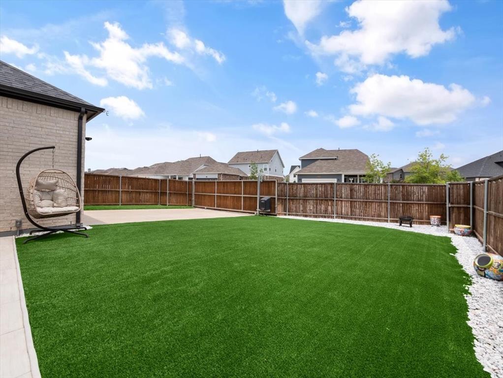 8240 Ottowa Ridge Frisco, TX 75034 - Photo 25 of 25 a view of a garden with a slide