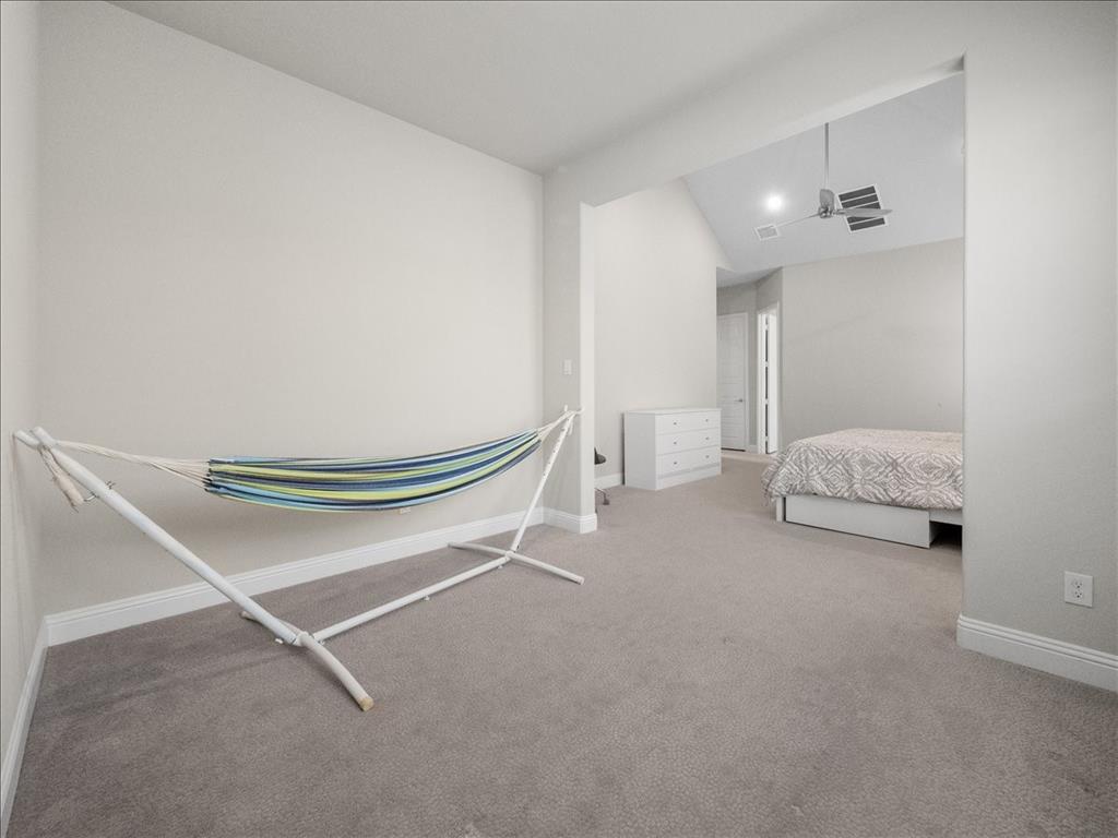 8240 Ottowa Ridge Frisco, TX 75034 - Photo 9 of 25 a living room with furniture and a ceiling fan
