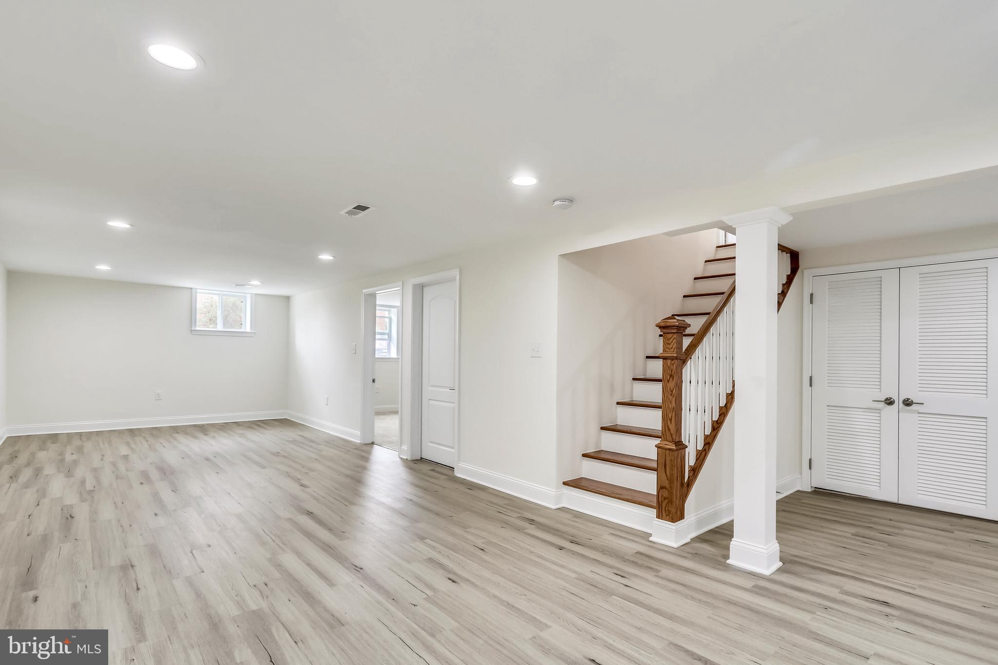12728 Gould Road Silver Spring, MD 20906 - Photo 16 of 28 New flooring in basement