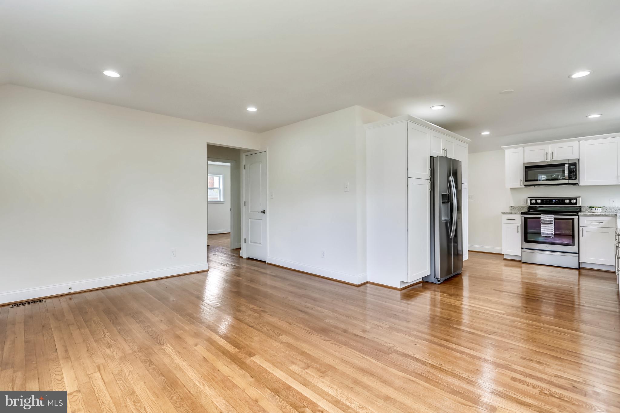 12728 Gould Road Silver Spring, MD 20906 - Photo 5 of 28 Gleaming hardwood floors