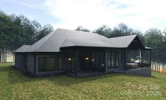 a view of a house with backyard and garden