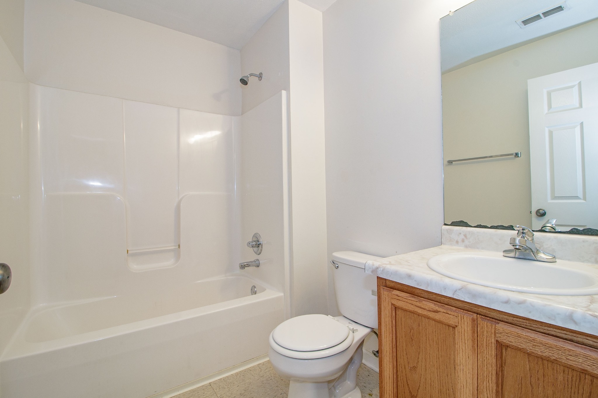 299 Raleigh Drive, Unit F2 Clarksville, TN 37043 - Photo 15 of 27 a bathroom with a sink a toilet and a bathtub