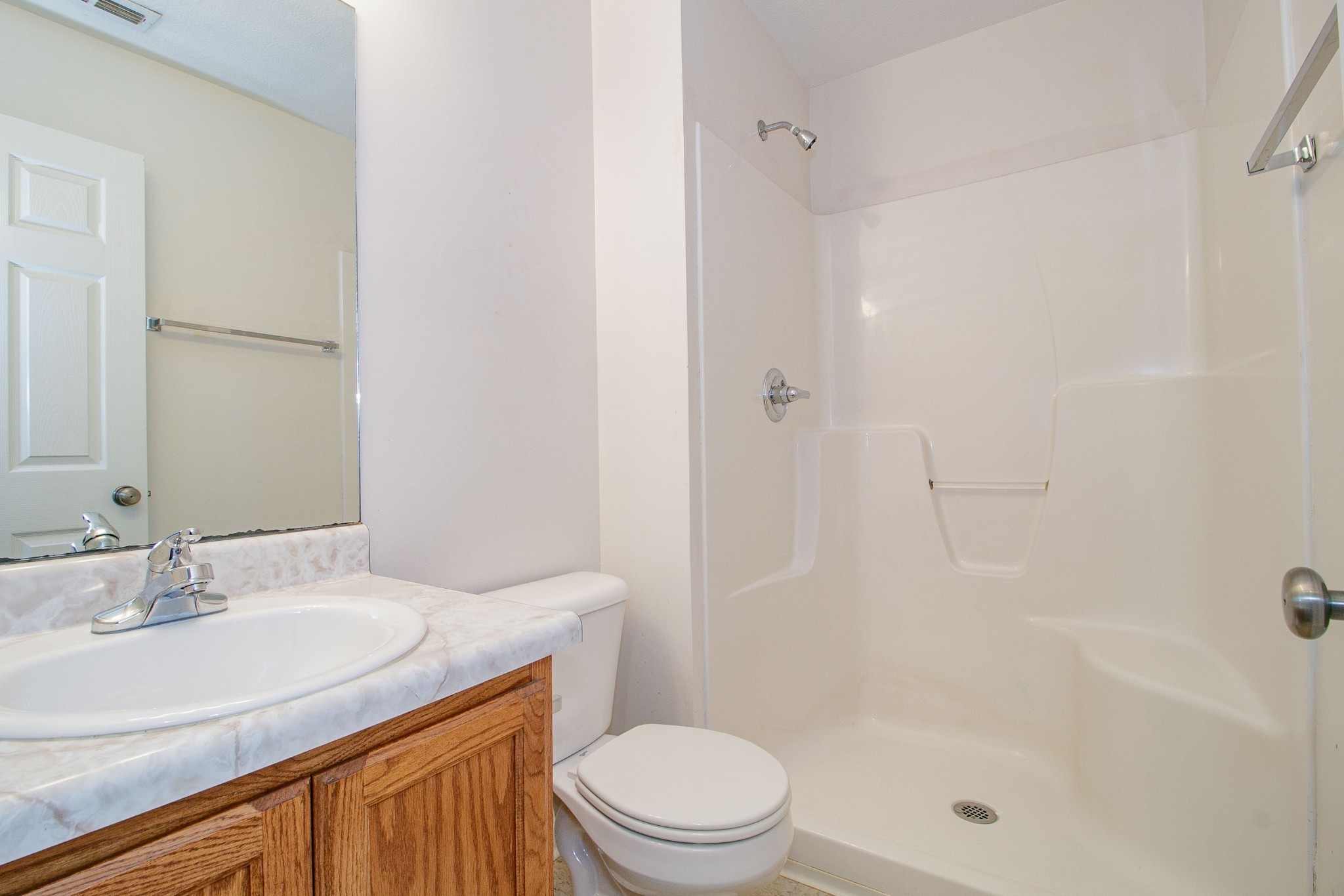 299 Raleigh Drive, Unit F2 Clarksville, TN 37043 - Photo 17 of 27 a bathroom with a sink a toilet and shower
