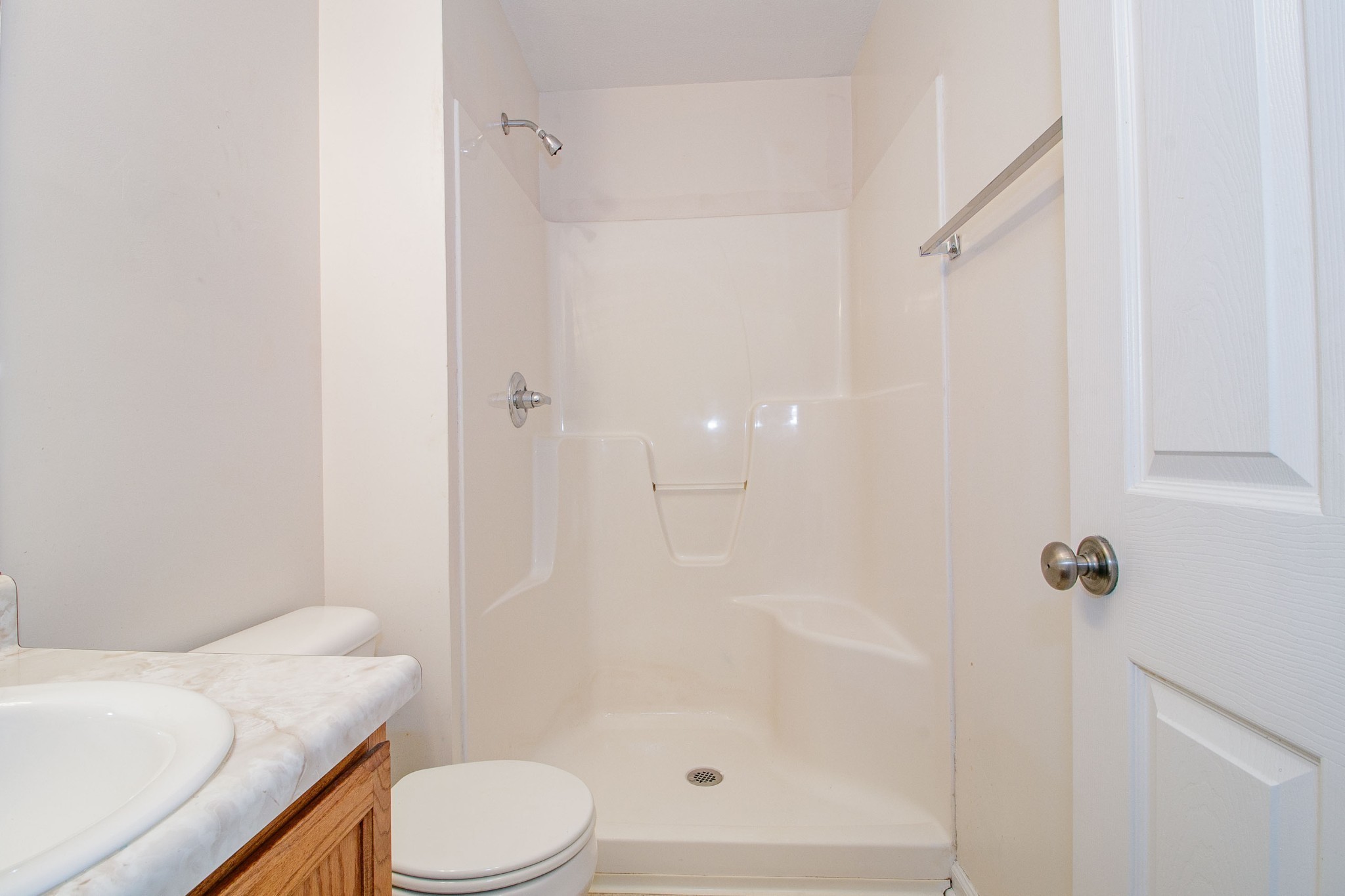 299 Raleigh Drive, Unit F2 Clarksville, TN 37043 - Photo 18 of 27 a bathroom with a sink a toilet and shower