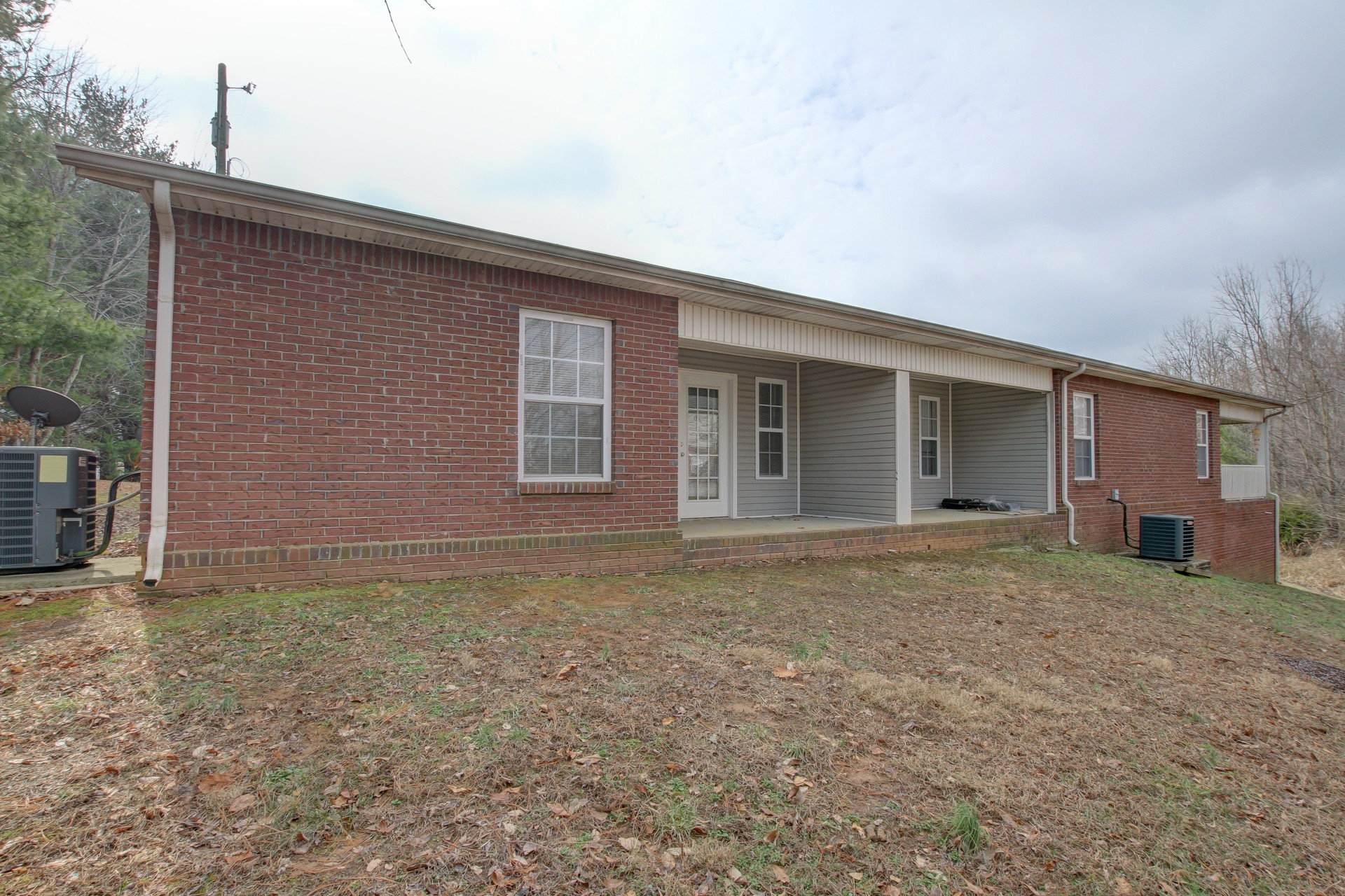 299 Raleigh Drive, Unit F2 Clarksville, TN 37043 - Photo 23 of 27 a view of a house with a backyard and porch