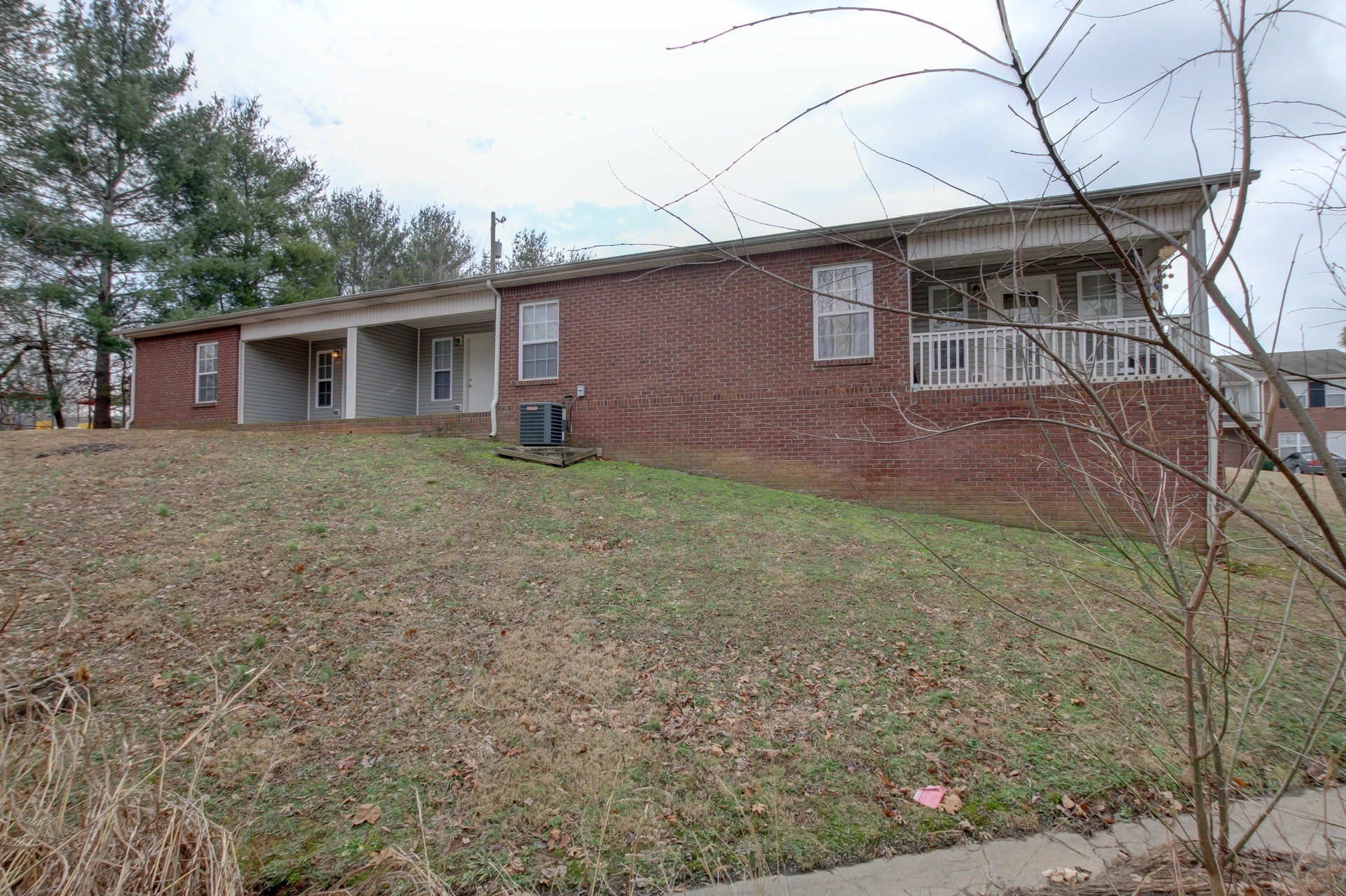 299 Raleigh Drive, Unit F2 Clarksville, TN 37043 - Photo 24 of 27 a view of a house with a yard